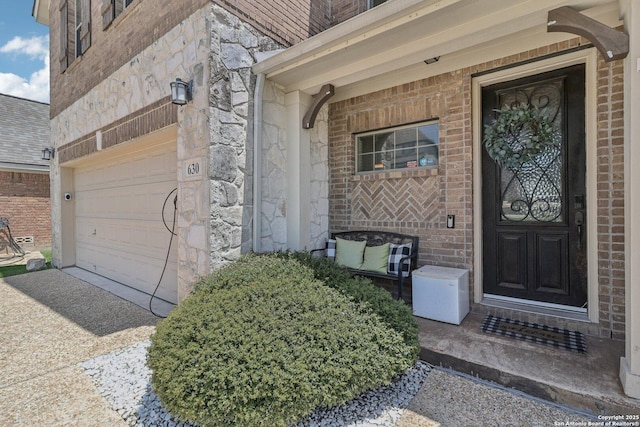 630 Oxalis, San Antonio, TX 78260 - entrance to property with stone siding, a garage, brick siding, driveway, and covered porch