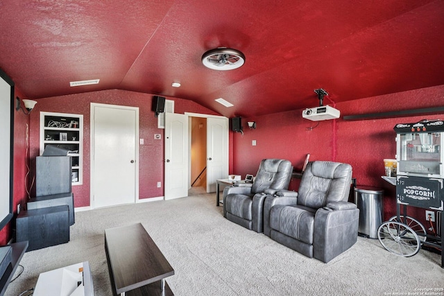 630 Oxalis, San Antonio, TX 78260 - home theater featuring vaulted ceiling, carpet floors, and a textured ceiling
