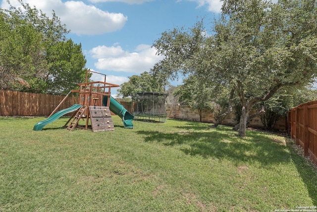 630 Oxalis, San Antonio, TX 78260 - fenced backyard with a playground and a trampoline