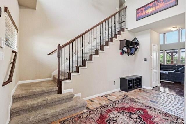 630 Oxalis, San Antonio, TX 78260 - stairway with a high ceiling and brick flooring