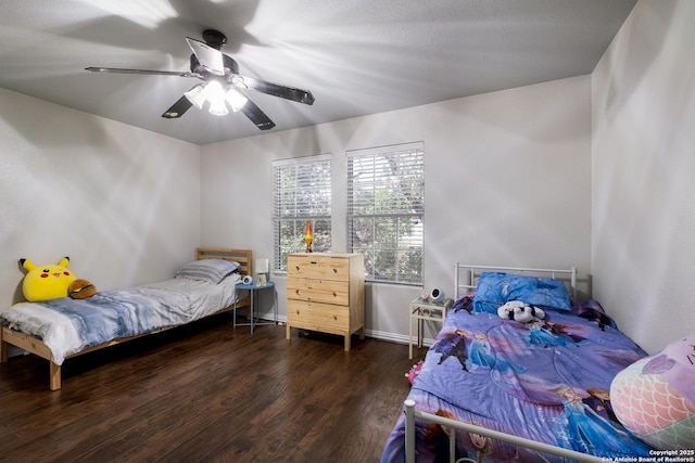 7907 Oakwood Pnes, San Antonio, TX 78254 - bedroom with wood finished floors and a ceiling fan