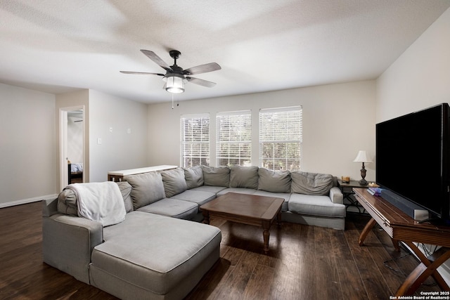7907 Oakwood Pnes, San Antonio, TX 78254 - living room featuring dark wood-type flooring and ceiling fan