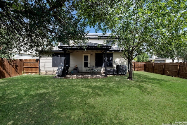 7907 Oakwood Pnes, San Antonio, TX 78254 - back of property with a fenced backyard and a patio