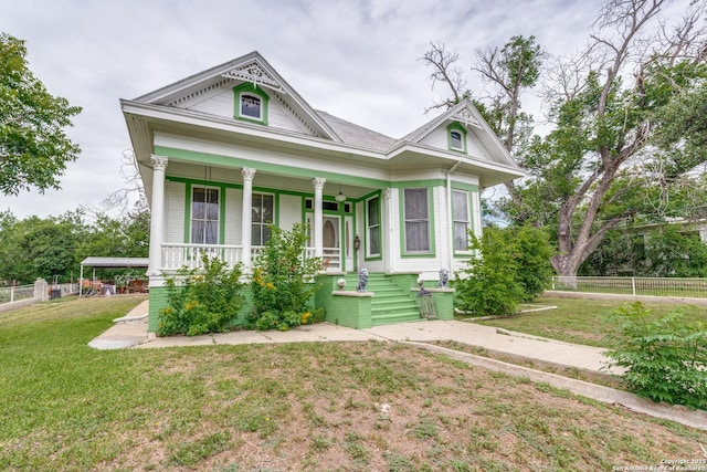 9248 Fm 725, Mcqueeney, TX 78123 - victorian-style house with covered porch