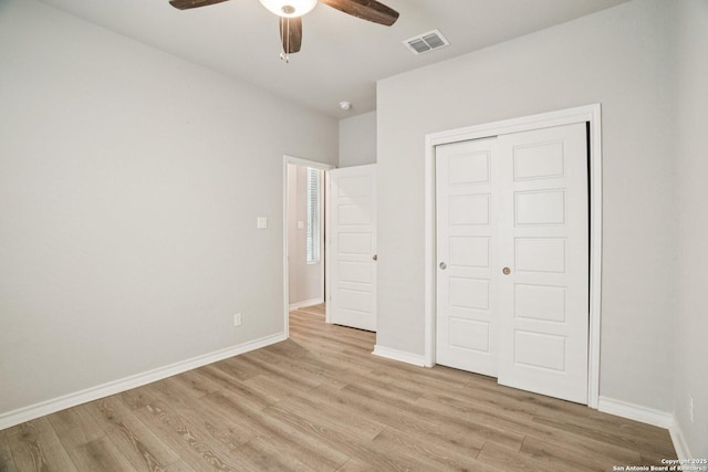 1533 Cawdon Park, Bulverde, TX 78163 - unfurnished bedroom featuring light wood-style flooring, a closet, and a ceiling fan