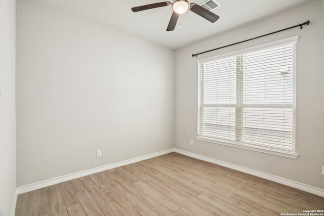 1533 Cawdon Park, Bulverde, TX 78163 - unfurnished room featuring light wood-style flooring, ceiling fan, and healthy amount of natural light
