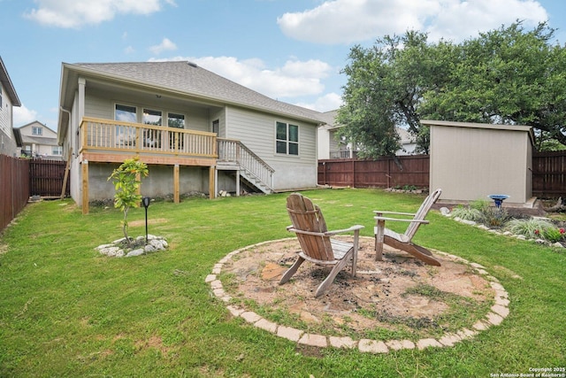 1533 Cawdon Park, Bulverde, TX 78163 - back of house with stairs, a fenced backyard, a deck, and an outbuilding