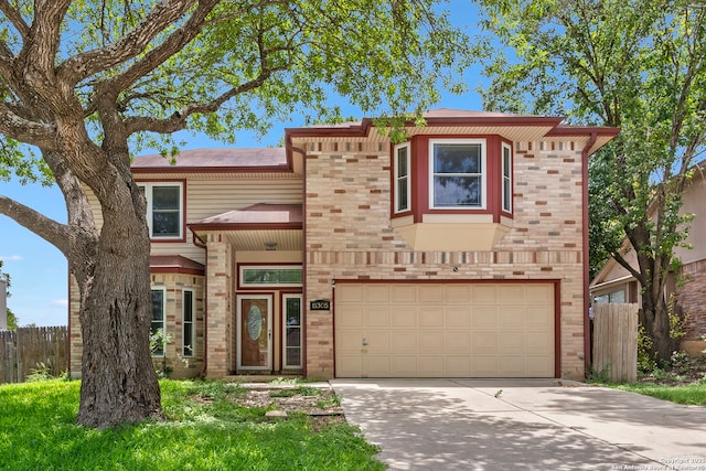 11305 Forest Night, Live Oak, TX 78233 - view of property with a garage, brick siding, and concrete driveway