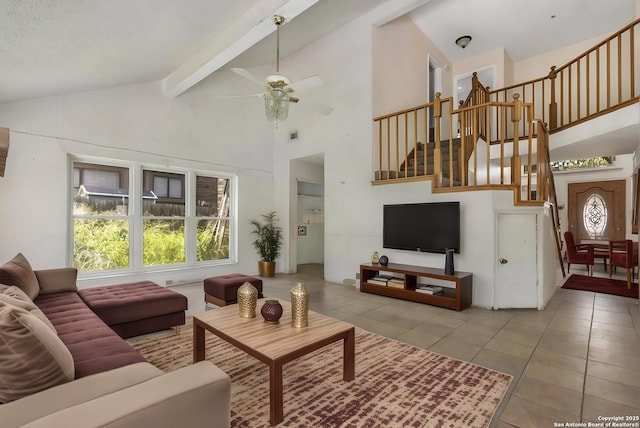 11305 Forest Night, Live Oak, TX 78233 - tiled living room with high vaulted ceiling, stairs, a ceiling fan, beamed ceiling, and plenty of natural light