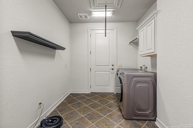 22715 Colibries, San Antonio, TX 78261 - washroom with cabinet space, dark tile patterned flooring, and washer and clothes dryer