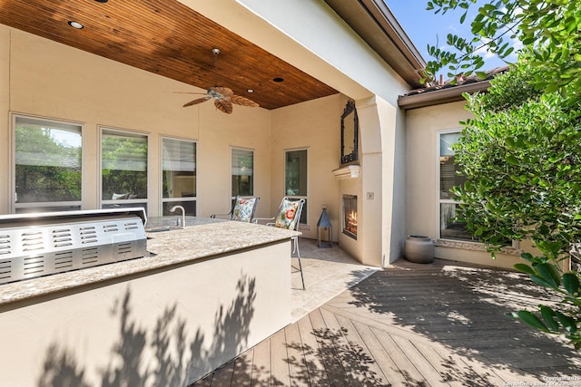 22715 Colibries, San Antonio, TX 78261 - view of patio / terrace with a ceiling fan and a wooden deck