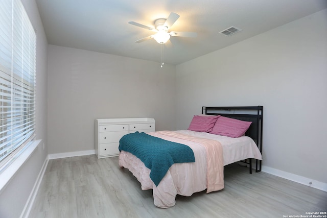 14946 Costa Leon, San Antonio, TX 78245 - bedroom with light wood-style floors and ceiling fan