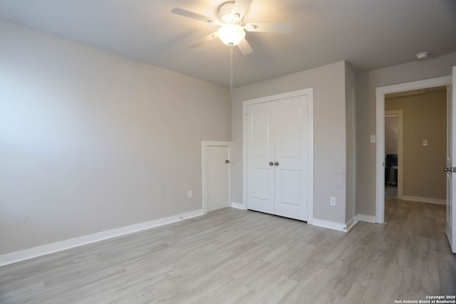 14946 Costa Leon, San Antonio, TX 78245 - unfurnished bedroom featuring light wood-style floors, a closet, and ceiling fan