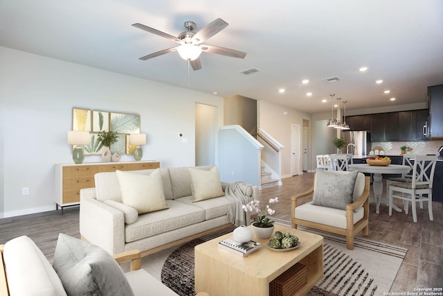 14946 Costa Leon, San Antonio, TX 78245 - living room featuring recessed lighting, wood finished floors, stairs, and a ceiling fan