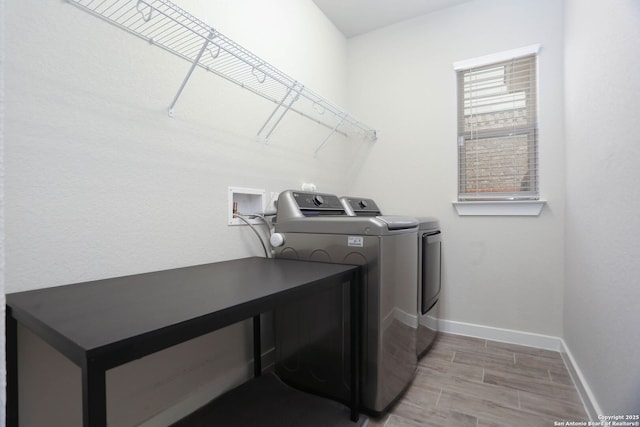 14946 Costa Leon, San Antonio, TX 78245 - washroom featuring washer and clothes dryer and wood tiled floors