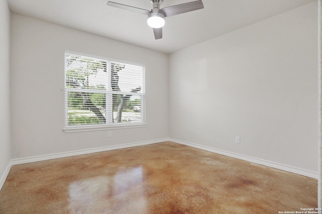 150 Hill Dr, Spring Branch, TX 78070 - empty room with concrete floors and ceiling fan