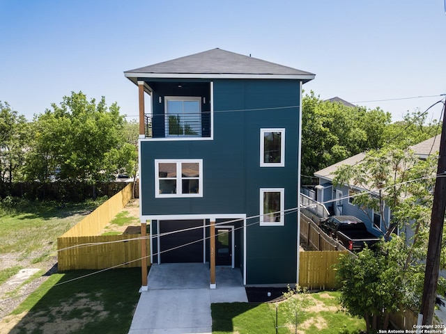 326 Cactus, San Antonio, TX 78203 - view of front of property featuring a balcony and roof with shingles