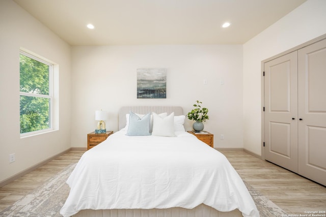 326 Cactus, San Antonio, TX 78203 - bedroom with light wood-style floors, recessed lighting, and a closet