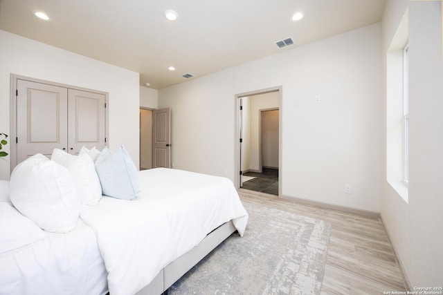 326 Cactus, San Antonio, TX 78203 - bedroom with light wood finished floors, recessed lighting, and a closet