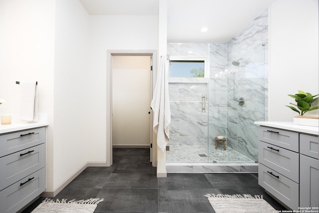326 Cactus, San Antonio, TX 78203 - bathroom with vanity, a marble finish shower, and recessed lighting