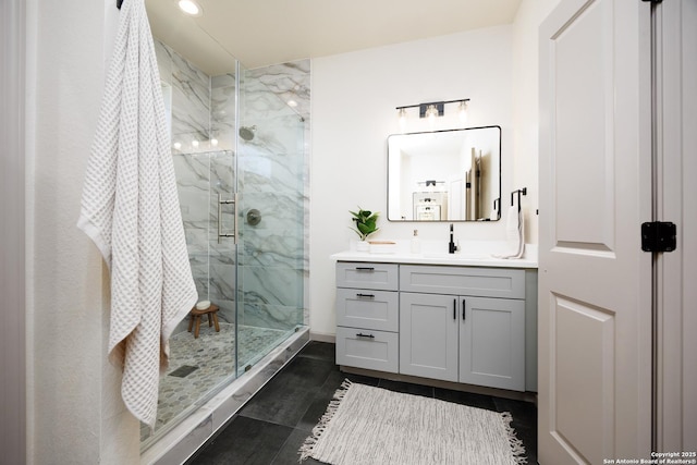 326 Cactus, San Antonio, TX 78203 - bathroom featuring a marble finish shower and vanity