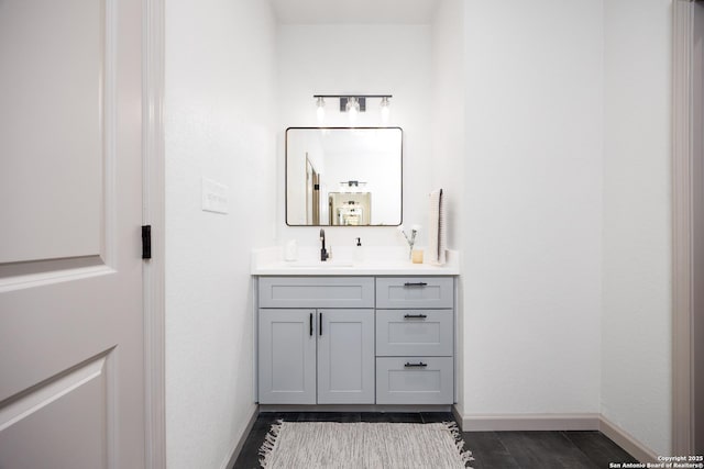 326 Cactus, San Antonio, TX 78203 - bathroom with vanity and wood finished floors