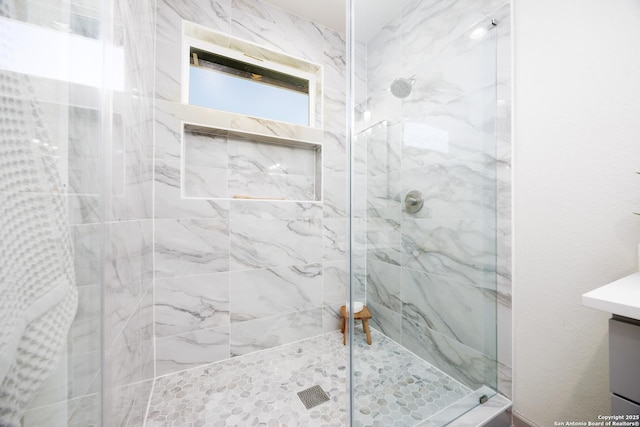 326 Cactus, San Antonio, TX 78203 - bathroom featuring a tile shower and vanity