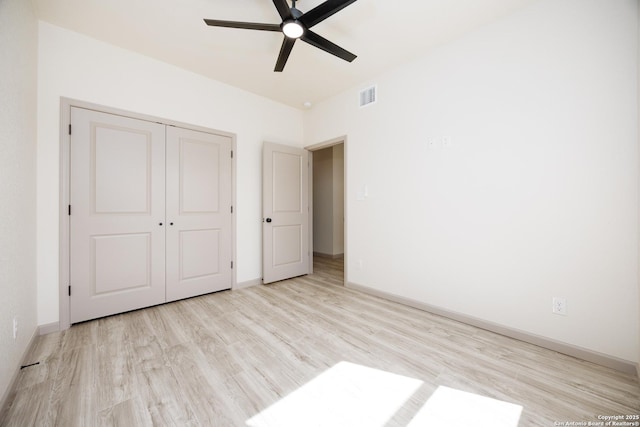 326 Cactus, San Antonio, TX 78203 - unfurnished bedroom featuring light wood-style floors, a closet, and a ceiling fan