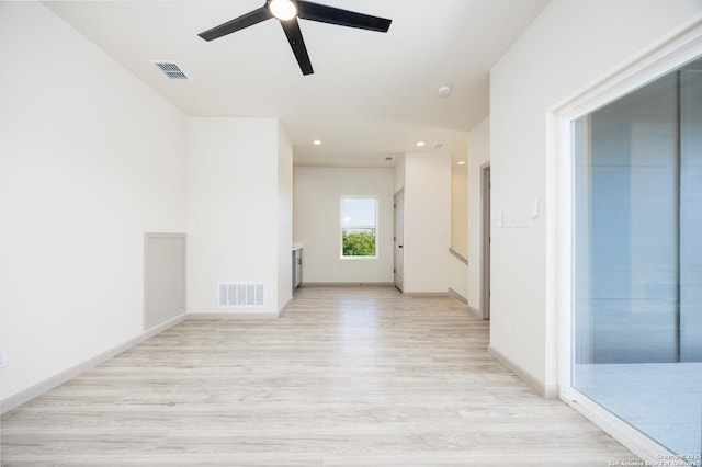 326 Cactus, San Antonio, TX 78203 - empty room with light wood-style floors, a ceiling fan, and recessed lighting