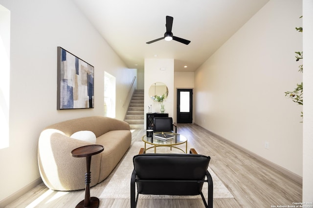 326 Cactus, San Antonio, TX 78203 - living area featuring light wood-type flooring, healthy amount of natural light, stairs, and a ceiling fan