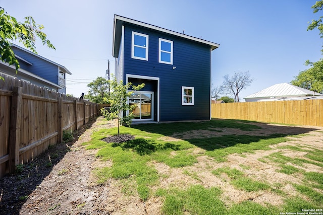 326 Cactus, San Antonio, TX 78203 - back of house with a fenced backyard