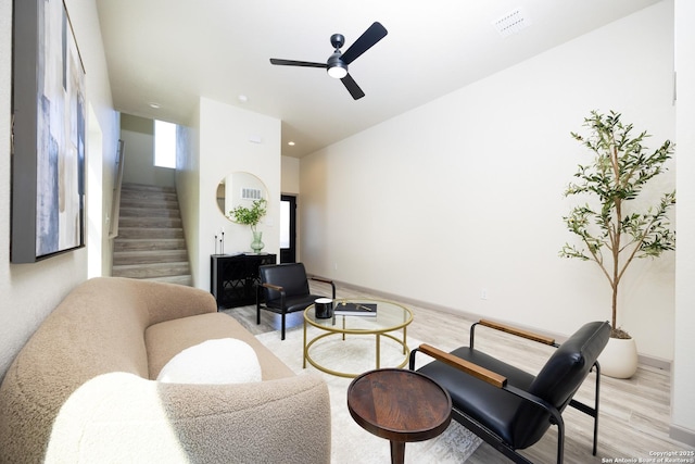 326 Cactus, San Antonio, TX 78203 - sitting room with stairway, light wood-style floors, and ceiling fan