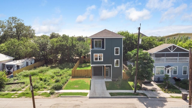 326 Cactus, San Antonio, TX 78203 - view of front of home with driveway, an attached garage, stairs, and stucco siding
