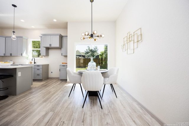 326 Cactus, San Antonio, TX 78203 - dining room featuring light wood-style flooring, a chandelier, and recessed lighting