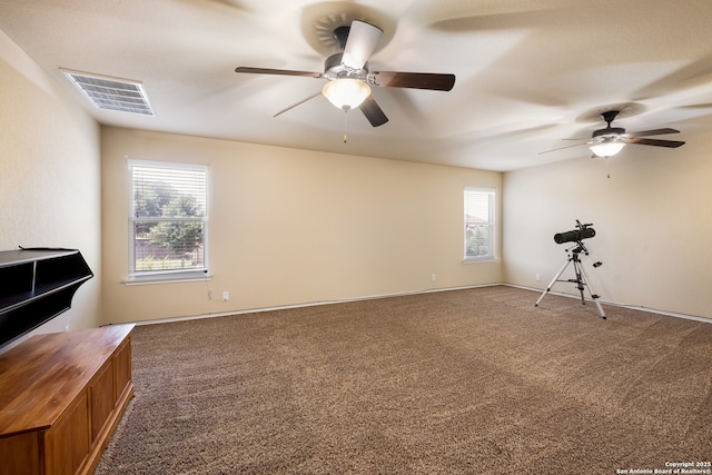 280 Tufted, San Antonio, TX 78253 - unfurnished living room featuring a ceiling fan, healthy amount of natural light, and carpet