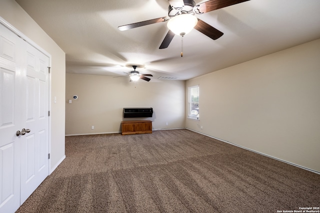 280 Tufted, San Antonio, TX 78253 - unfurnished living room featuring a ceiling fan, carpet, and heating unit