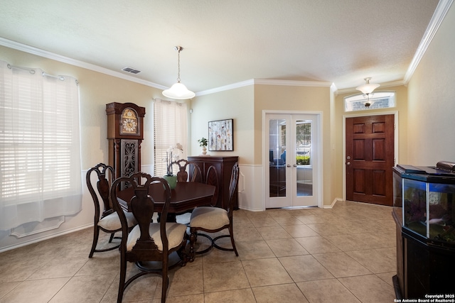 280 Tufted, San Antonio, TX 78253 - dining area featuring french doors, healthy amount of natural light, ornamental molding, and light tile patterned floors