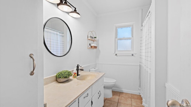 1703 Redwood, Seguin, TX 78155 - bathroom with vanity, a wainscoted wall, ornamental molding, and tile patterned flooring