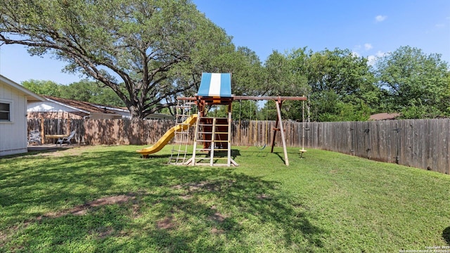 1703 Redwood, Seguin, TX 78155 - view of jungle gym featuring a fenced backyard