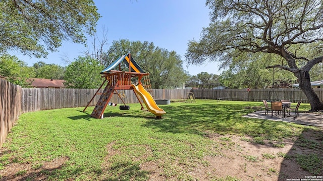 1703 Redwood, Seguin, TX 78155 - view of playground with a fenced backyard and a patio