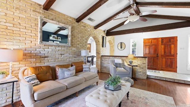 1703 Redwood, Seguin, TX 78155 - living room with wood-type flooring, ceiling fan, and brick wall