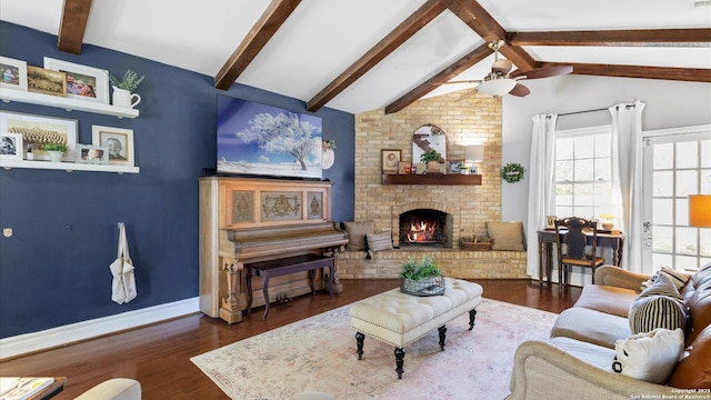 1703 Redwood, Seguin, TX 78155 - living room featuring ceiling fan, a brick fireplace, and wood finished floors