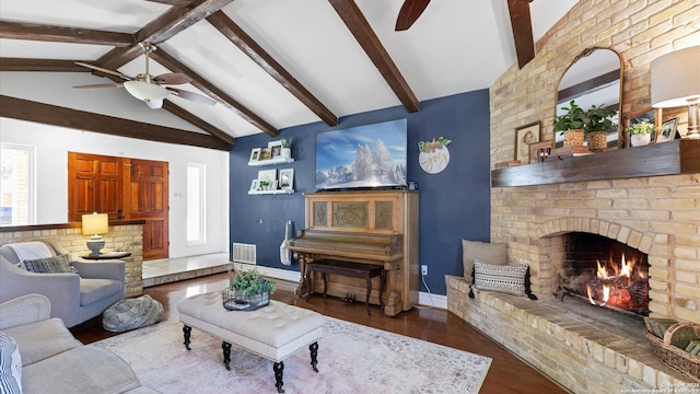 1703 Redwood, Seguin, TX 78155 - living room with ceiling fan, wood finished floors, a brick fireplace, and plenty of natural light