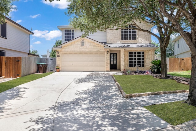 9915 Mustang Isle, San Antonio, TX 78254 - traditional-style house with stone siding, a garage, and driveway