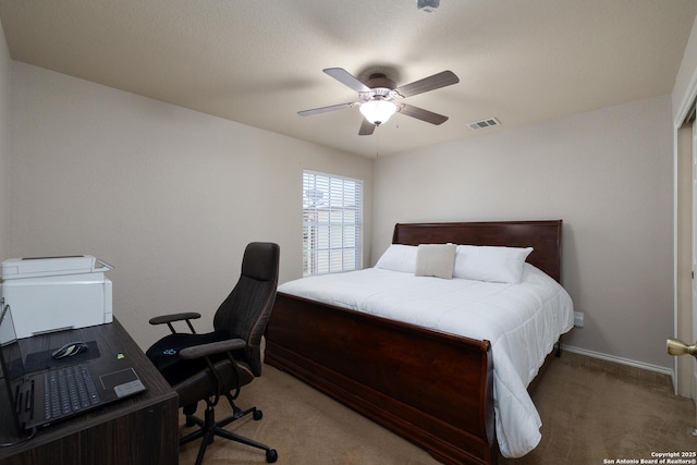 9915 Mustang Isle, San Antonio, TX 78254 - bedroom featuring light colored carpet, a desk, and a ceiling fan