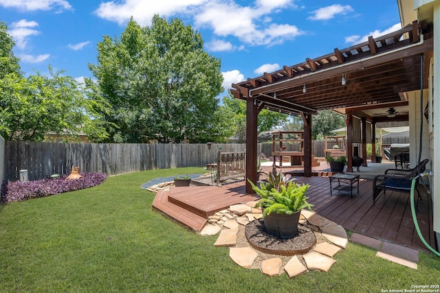 9915 Mustang Isle, San Antonio, TX 78254 - fenced backyard featuring a wooden deck and a ceiling fan