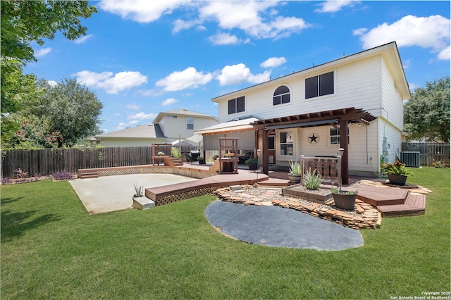 9915 Mustang Isle, San Antonio, TX 78254 - back of house featuring a fenced backyard, a wooden deck, and a patio