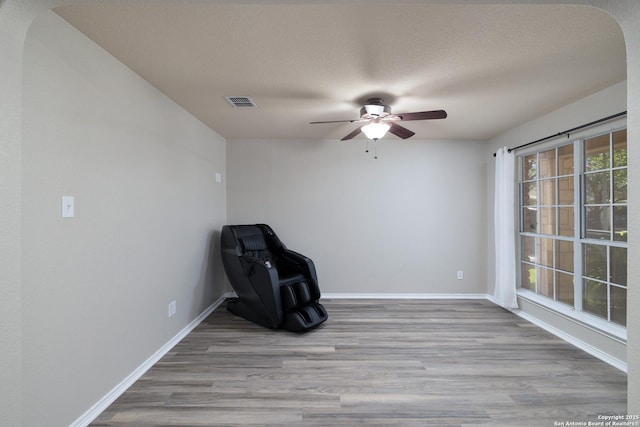 9915 Mustang Isle, San Antonio, TX 78254 - unfurnished room featuring a ceiling fan and wood finished floors