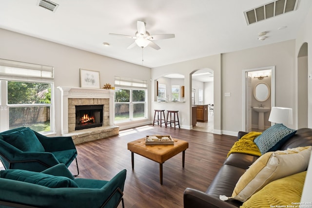 18310 Redwood Path, San Antonio, TX 78259 - living area featuring arched walkways, healthy amount of natural light, and a ceiling fan