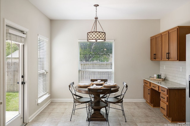 18310 Redwood Path, San Antonio, TX 78259 - dining room with healthy amount of natural light and light tile patterned flooring